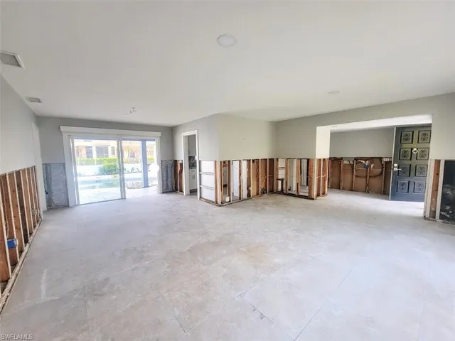Dining Room w/Sliders to Lanai and Entry to Kitchen