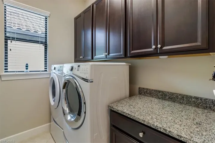 Offers a sink opposite from washer/dryer