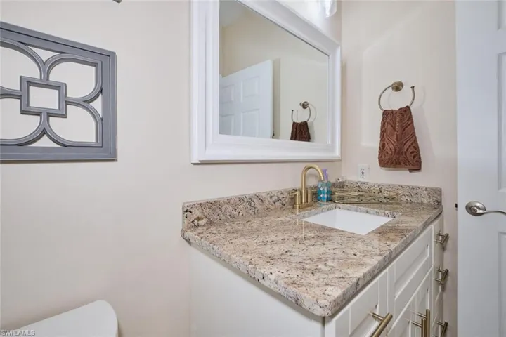 Bathroom with toilet and vanity