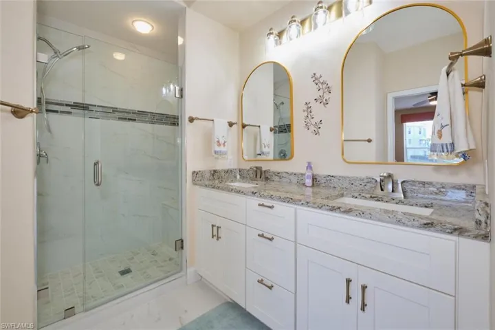Bathroom with vanity and walk in shower