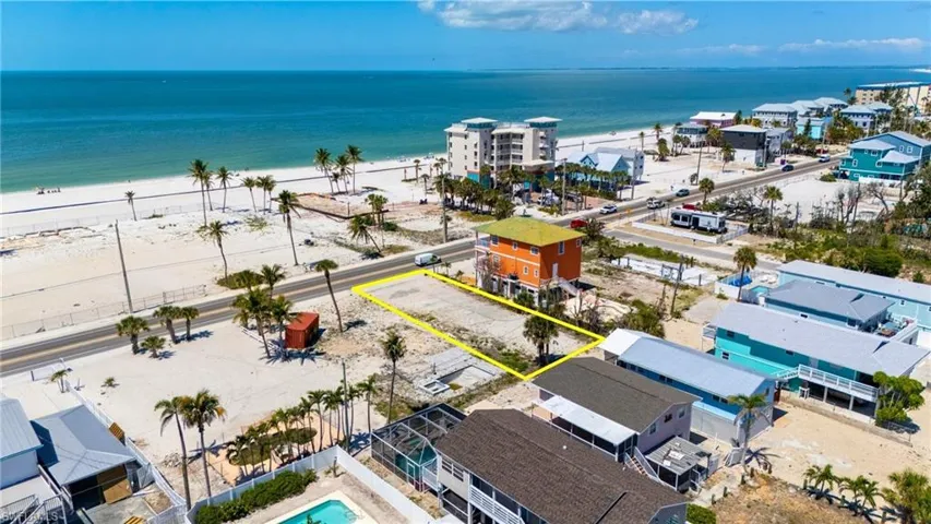 Bird's eye view with a beach view and a water view - VIRTUALLY EDITED EXTERIOR IMAGE