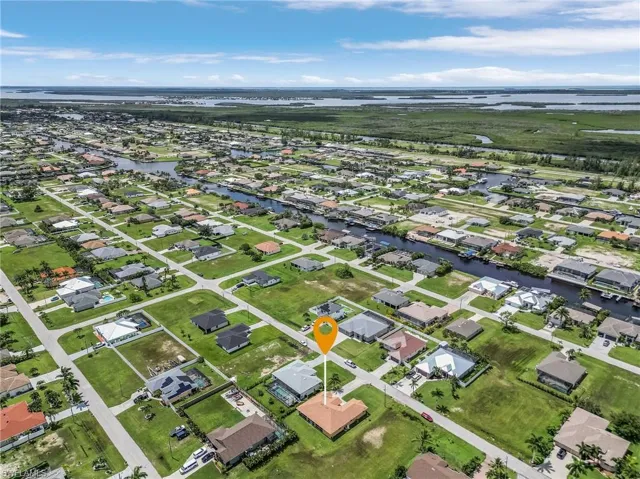 Birds eye view of property featuring a water view.