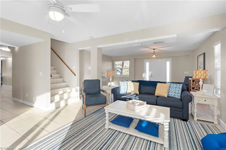 Tiled living room with ceiling fan