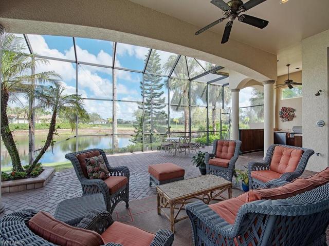 Lanai with plenty of seating and built in kitchen