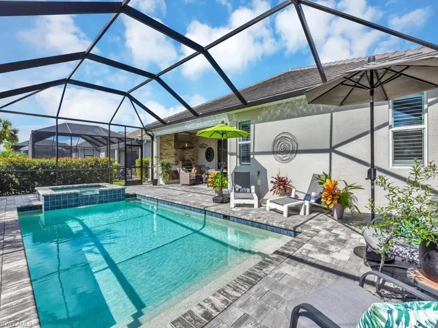Saltwater pool paired with a large covered lanai for ultimate outdoor living