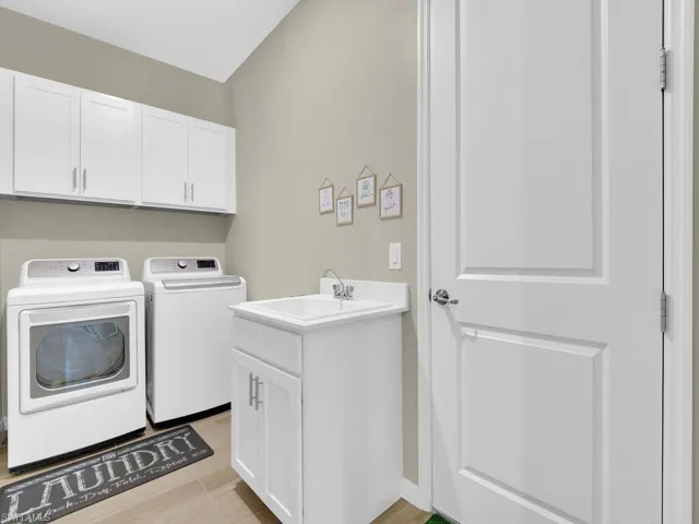 One of the few designs with a true laundry room, complete with a sink and storage, off the garage