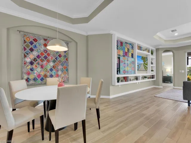 Bright dining space flowing into the kitchen and living area