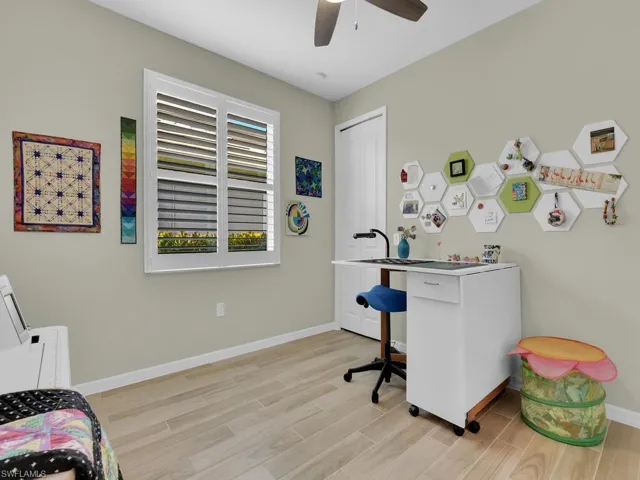 Versatile den, perfect for an office, hobby room, or flex space