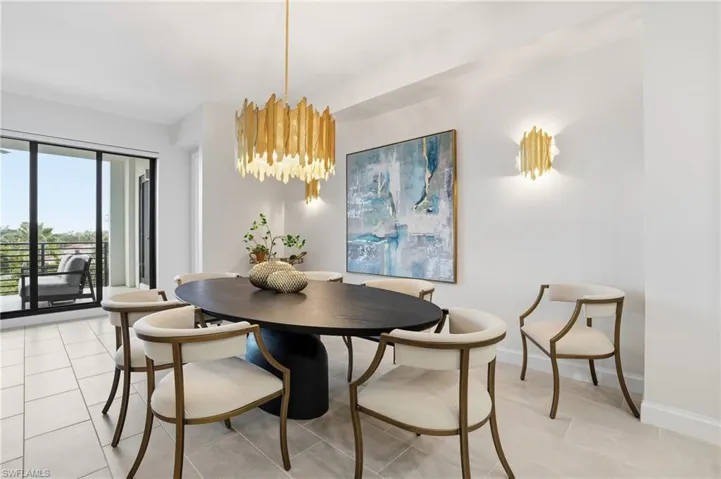 Dining room featuring baseboards and light tile patterned floors