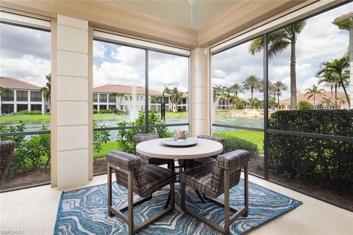 Sunroom featuring ceiling fan