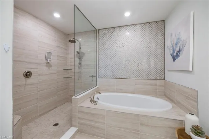 Full bath with a garden tub and walk in shower