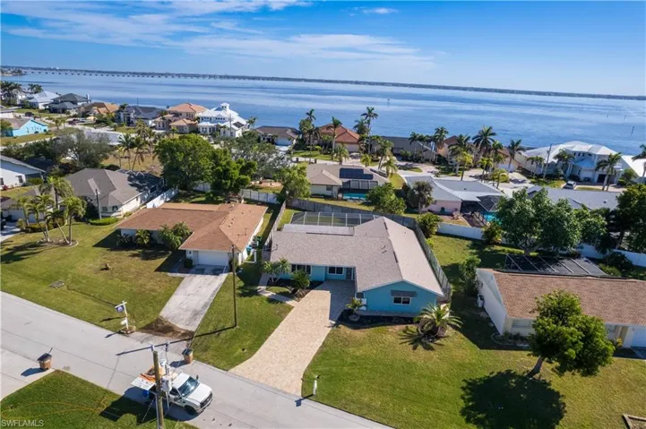 Bird's eye view with a water view and a residential view