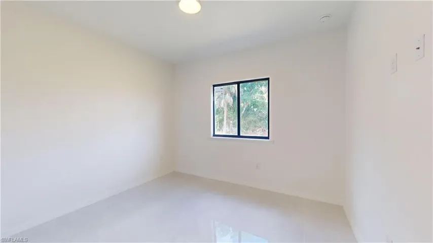 Spare room with baseboards