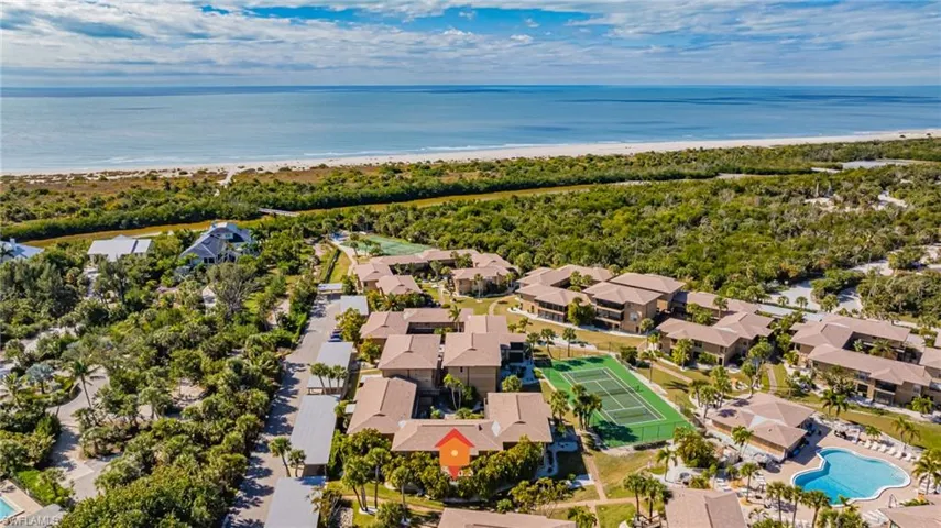 Aerial view of residential area with a nearby body of water