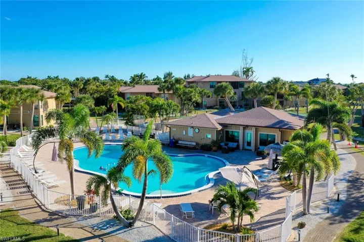 Community pool with a patio area