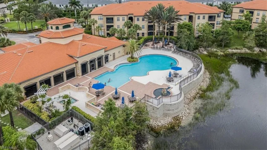 Community pool with a patio area