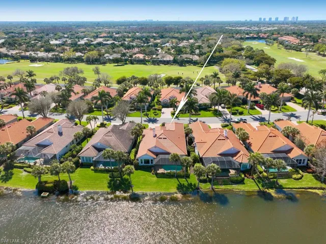 Drone view of house from lakeside looking south