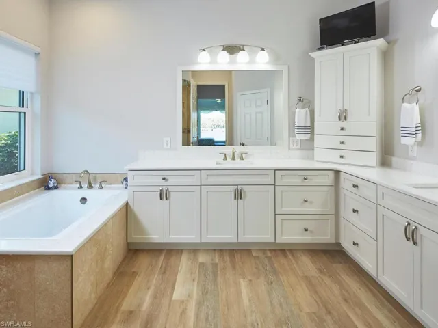 Master Bath renovated in 2022. Soaking tub, dual sinks, new cabinetry, lighting, sinks and fixtures.