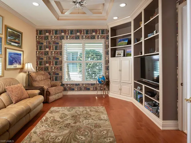 Relaxing Media Room, wood flooring, double tray ceiling.