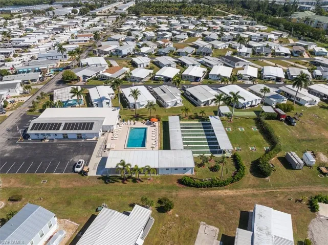 View of property location featuring nearby suburban area and a pool