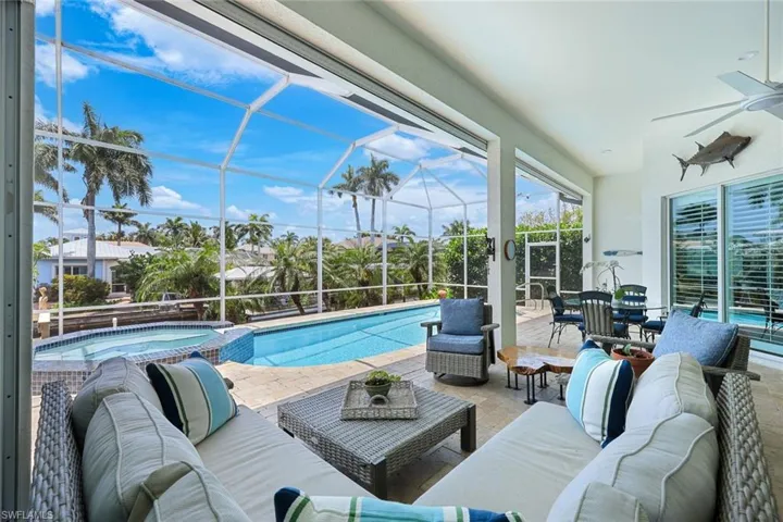 The perfect home for entertaining your friends and family! Stone flooring throughout the lanai/patio area.
