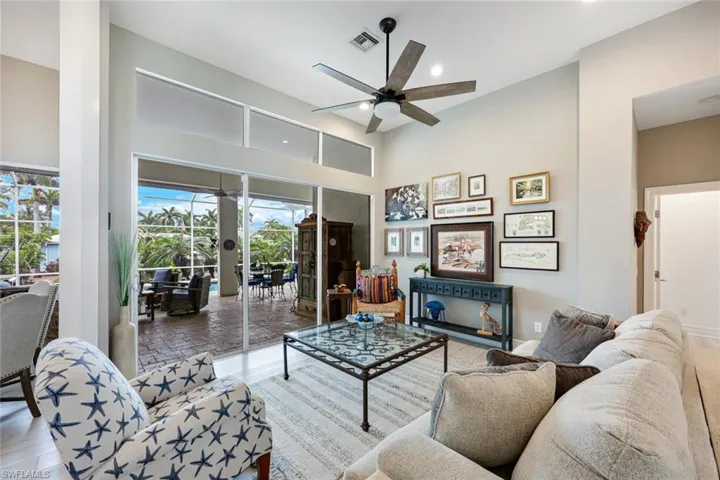 Sliding doors adjoin indoor/outdoor spaces.