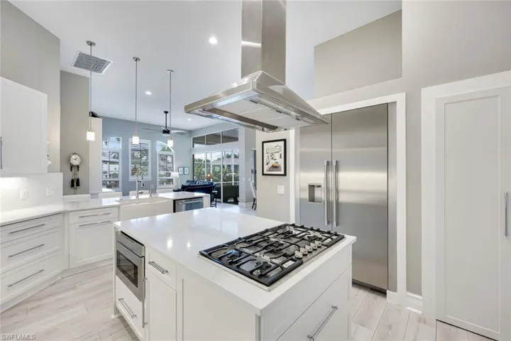 Thermador kitchen appliances, HUGE island, & premium kitchen cabinets/countertops are just a few of this kitchen's highlights.