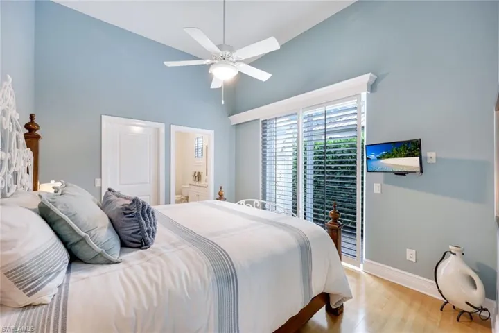 Second bedroom offers access to the outdoors.