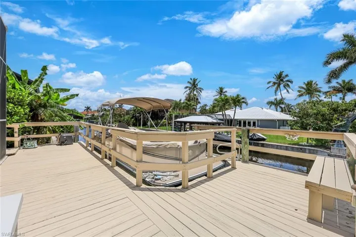 Home features a 10,000 pound boat lift.