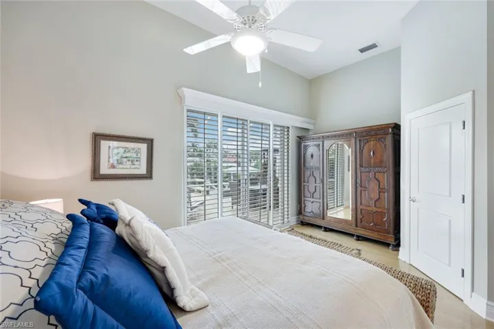 Third bedroom offers lanai/pool access.