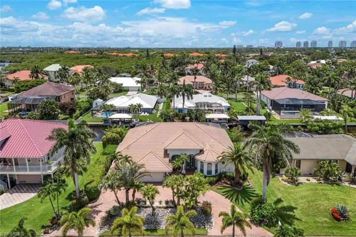 Aerial view of the front of this stately home, minutes to Historic Downtown Bonita Springs AND the Gulf.