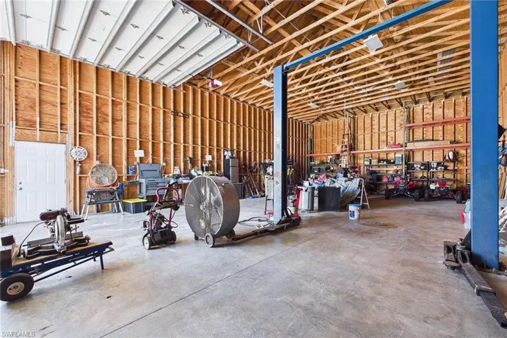 Detached Garage High ceilings and plenty of shelves