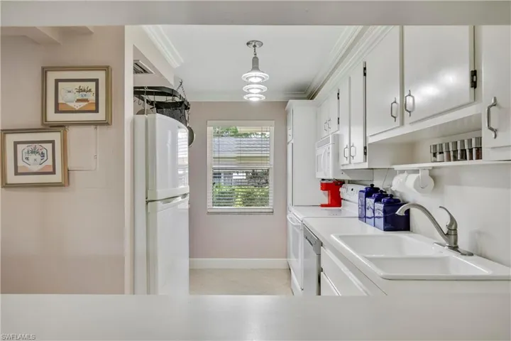 Nice size kitchen, hanging pot rack