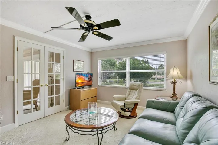Double doors leading in with large window