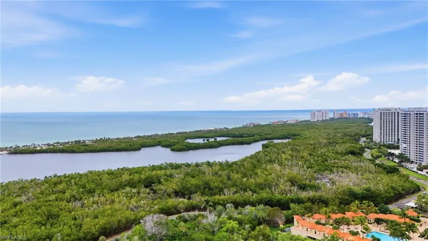 Endless views of the 2.5 miles of private Pelican Bay beach