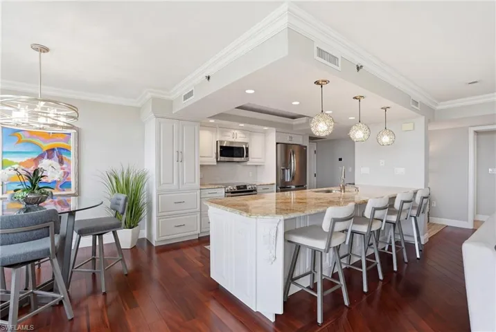 The kitchen features island bar seating for entertaining
