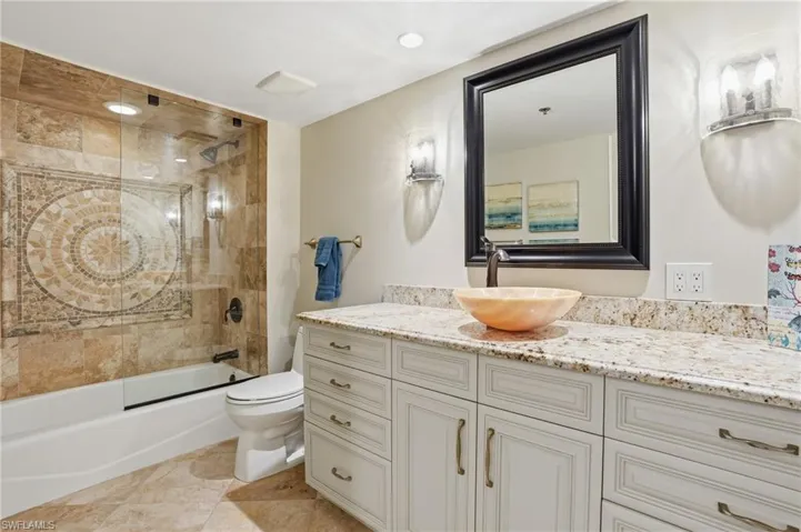 The guest bath offers space and comfort