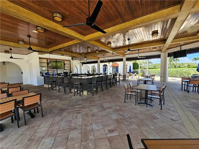 View of pool side Sunset's outdoor dining patio