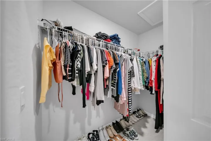 Walk in closet with attic access