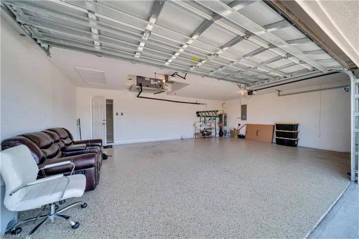 Garage featuring electric panel