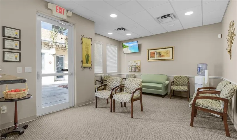 Waiting room featuring light carpet, recessed lighting, visible vents, and baseboards