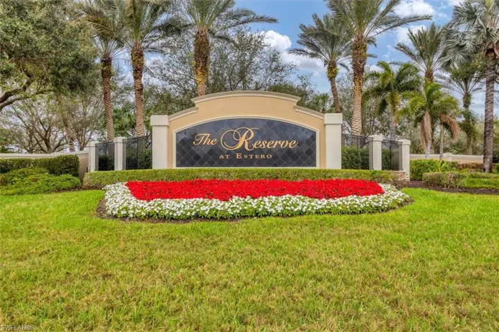 Community sign featuring a yard