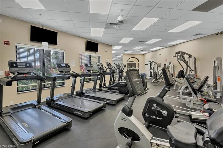 Exercise room with a paneled ceiling
