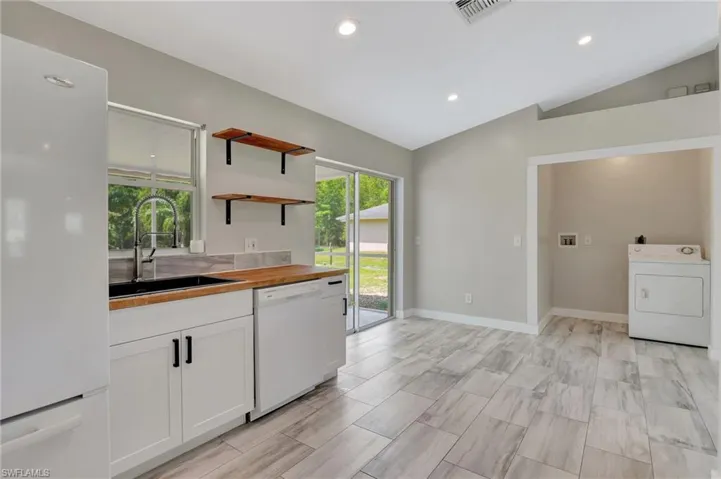 Kitchen, Dining area, Laundry closet