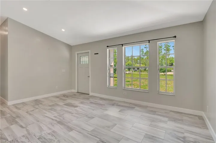 Great Room, Vaulted Ceilings, All new paint, Gorgeous Tile floors