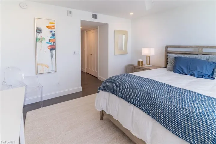 Bedroom featuring wood finished floors, recessed lighting, and ceiling fan
