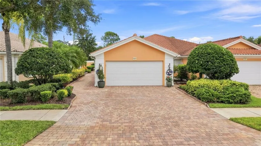 Front garage entry with extended driveway pavers