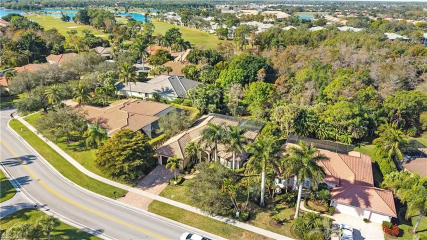 Aerial view of residential area with a nearby body of water