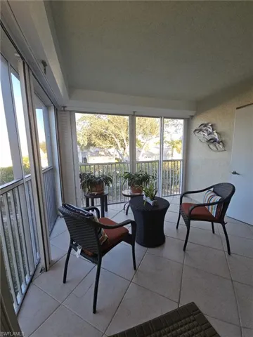 Sunroom with a balcony