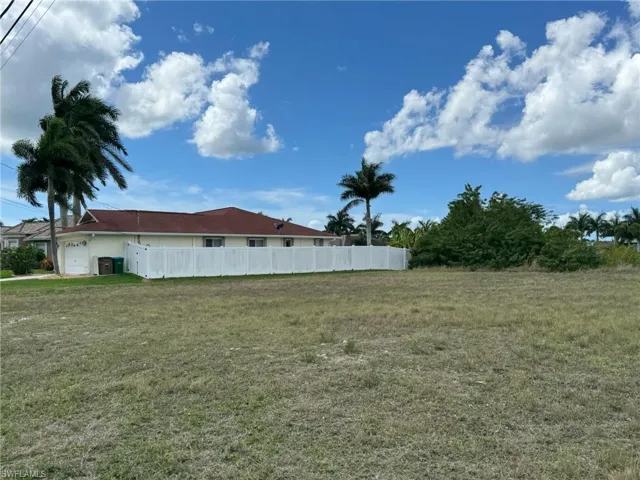 NEIGHBOR ON S SIDE of property